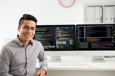 Developer sitting at his desk