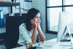 User looking at screen, wishing she had someone to call